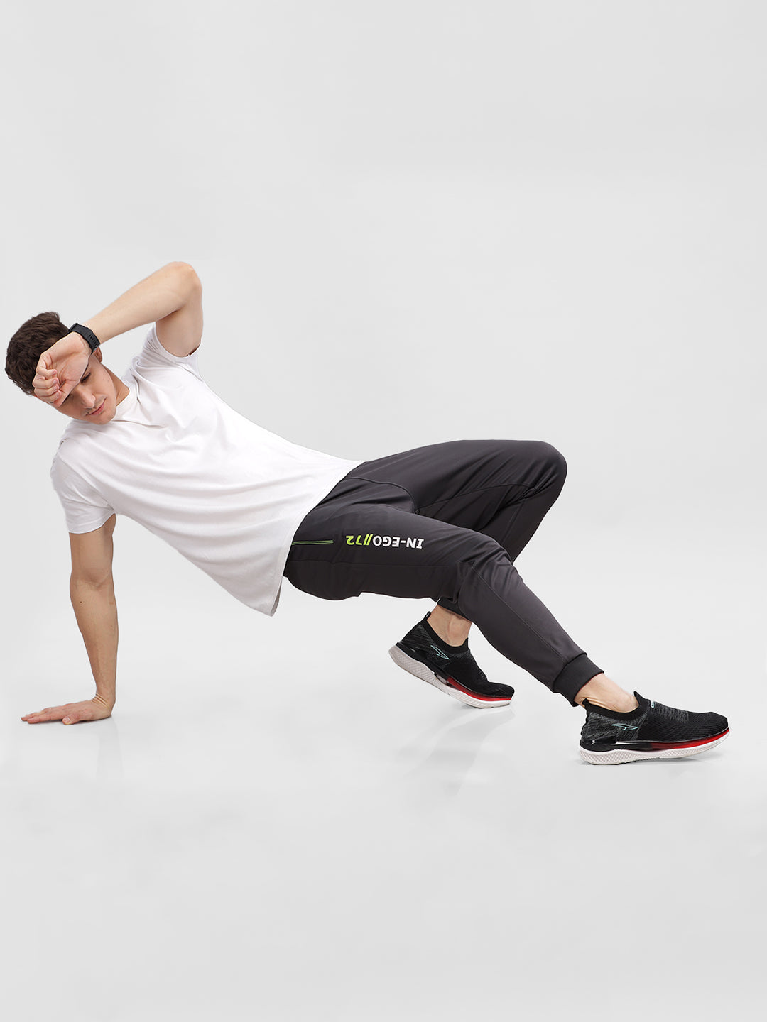 INEGO Men Casual Stretch Joggers Luxury Polyester Interlock Fabric HD Print at the Side Contrast Zipper Pocket Regular Fit Dark Grey Solid Size M (Dark Grey, Grey Melange, Maroon, Navy, Black) Inego #color_Charcoal