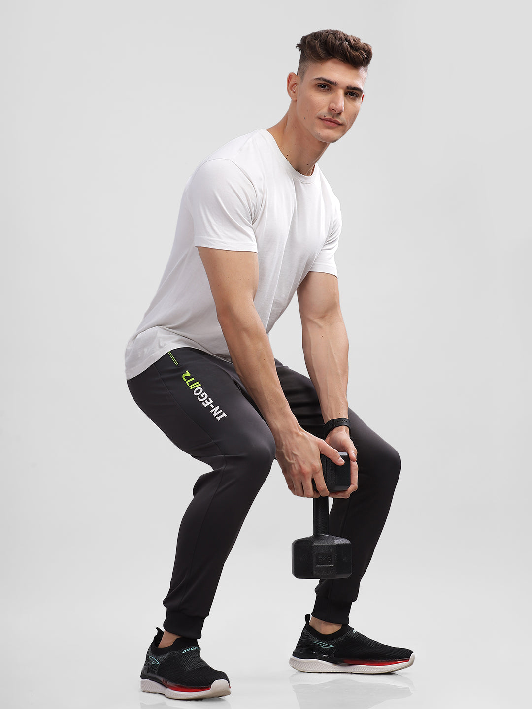 INEGO Men Casual Stretch Joggers Luxury Polyester Interlock Fabric HD Print at the Side Contrast Zipper Pocket Regular Fit Dark Grey Solid Size M (Dark Grey, Grey Melange, Maroon, Navy, Black) Inego #color_Charcoal
